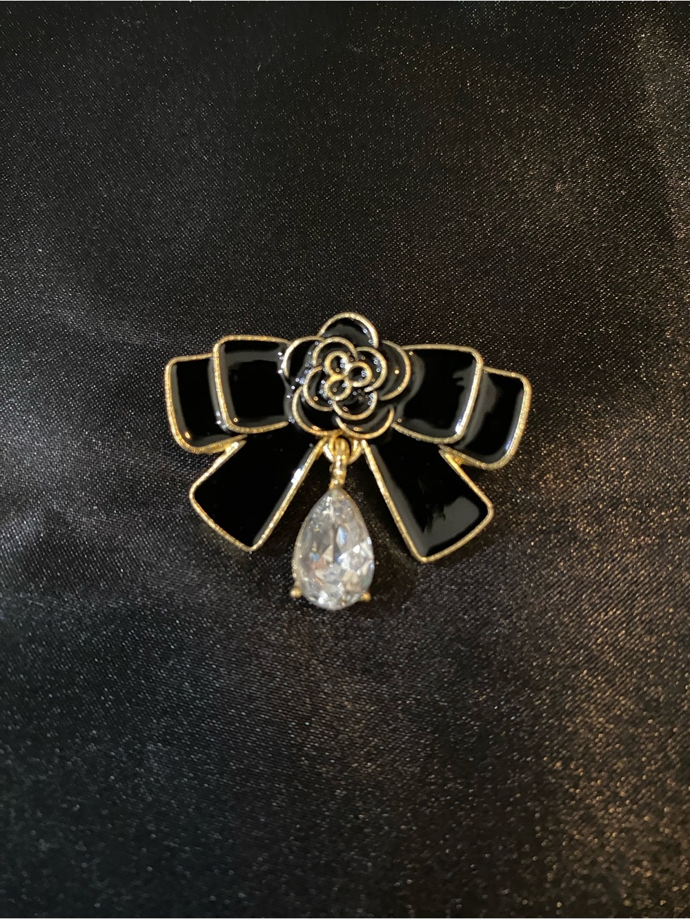 Black Enamel Bow Brooch with Teardrop Crystal Accent